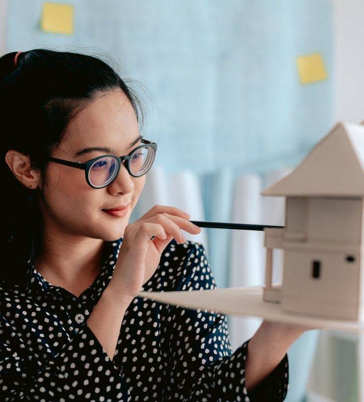 Portrait of female architects in office looking construction project.Architect, Engineer, Architecture, Design, Planning, Occupation concept. Portrait of female architects in office looking construction project.Architect, Engineer, Architecture, Design, Planning, Occupation concept.